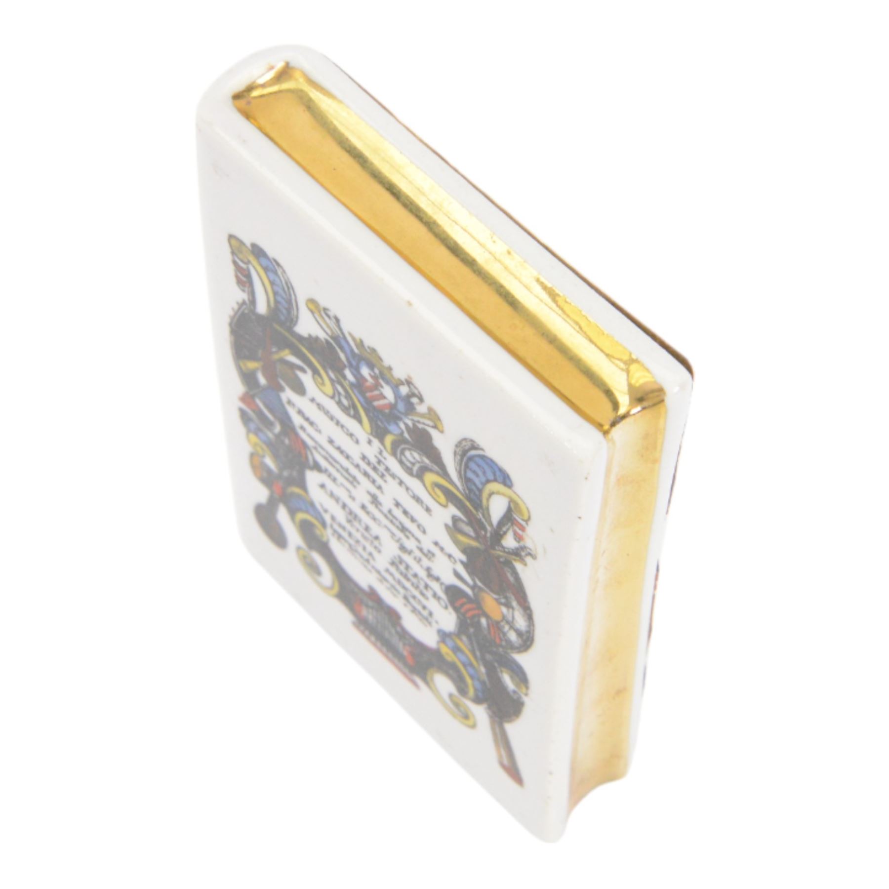 Fornasetti paperweight modelled as a book, titled to the spine IL Mvsico Testore, green felt back with printed mark, L11cm