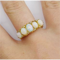 18ct gold graduating five stone opal ring, with diamond accents set between, hallmarked