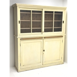  Mid century large painted butler unit, projecting cornice, two sliding glazed doors enclosing three shelves above two slides and two cupboard doors, plinth base, W158cm, H184cm, D41cm  