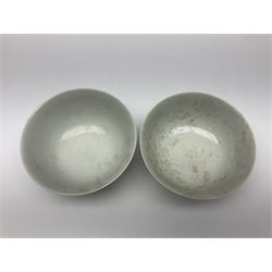 Pair of Chinese famille jaune bowls, decorated in green enamel with a dragon chasing a flaming pearl amongst clouds, upon a yellow ground, the interior decorated to centre with dragon, with six character mark beneath, D17.5cm