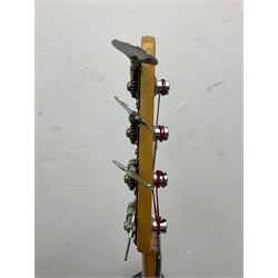 1962 Fender Precision bass guitar; re-finished in natural alder in the 1970s; impressed date code 5NOV62C to end of neck and serial no.90537 to back plate; L115.5cm; in replacement hard carrying case