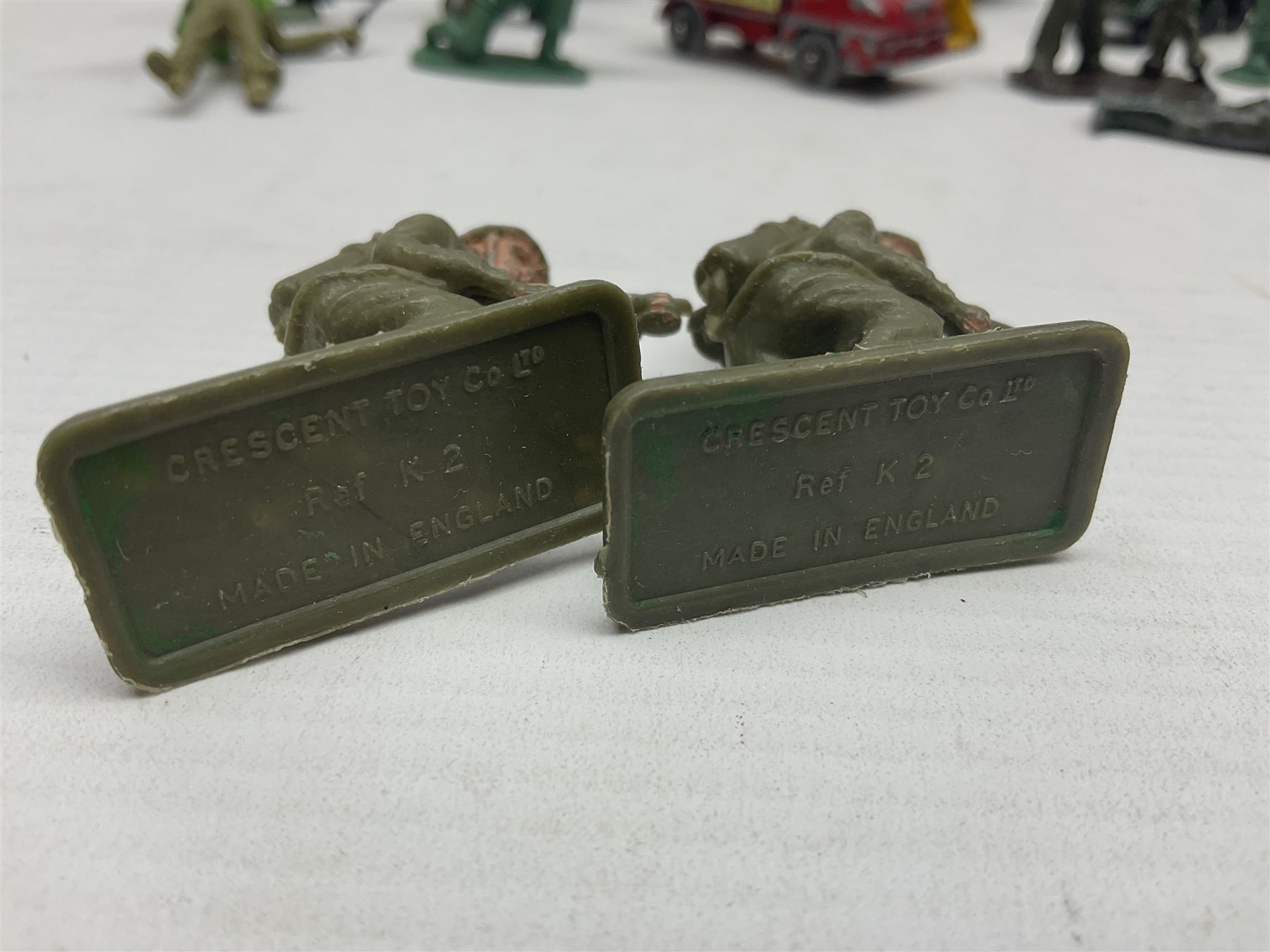 Various makers - unboxed and playworn die-cast models including Dinky Thornycroft Mighty Antar Tank Transporter No.660 and Centurion Tank No.651, other military and farm vehicles; and quantity of loose plastic soldiers and other figures by Crescent, Britains etc
