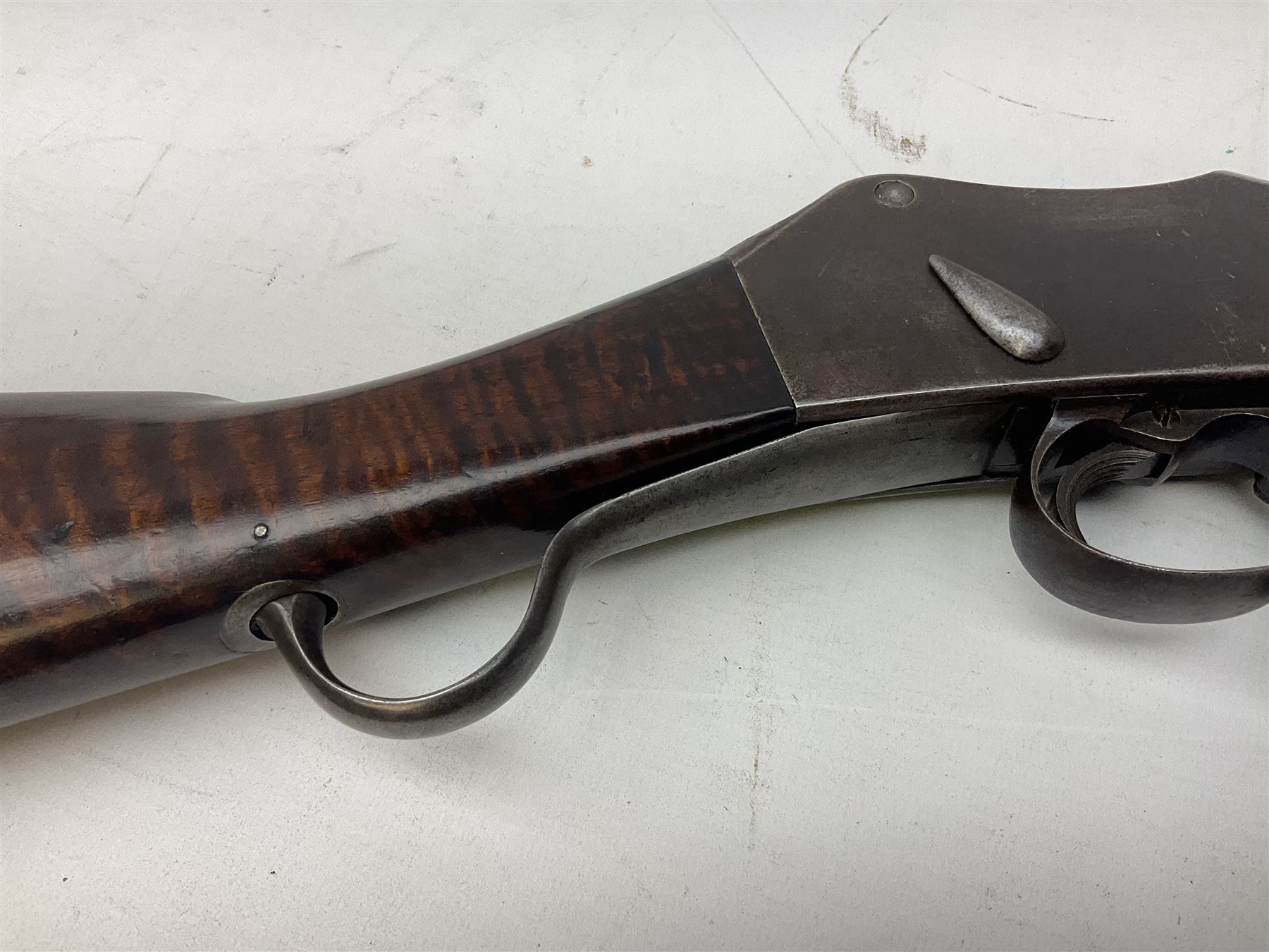 Braendlin Armoury Martini action .577/450 falling back rifle, the 85cm rifled barrel stamped Alex. Henry Edinburgh & London with two barrel bands including Yatagan bayonet side fitting and clearing rod under, with leather sling, serial no.13332, L126cm (NB. Firing pin broken). 