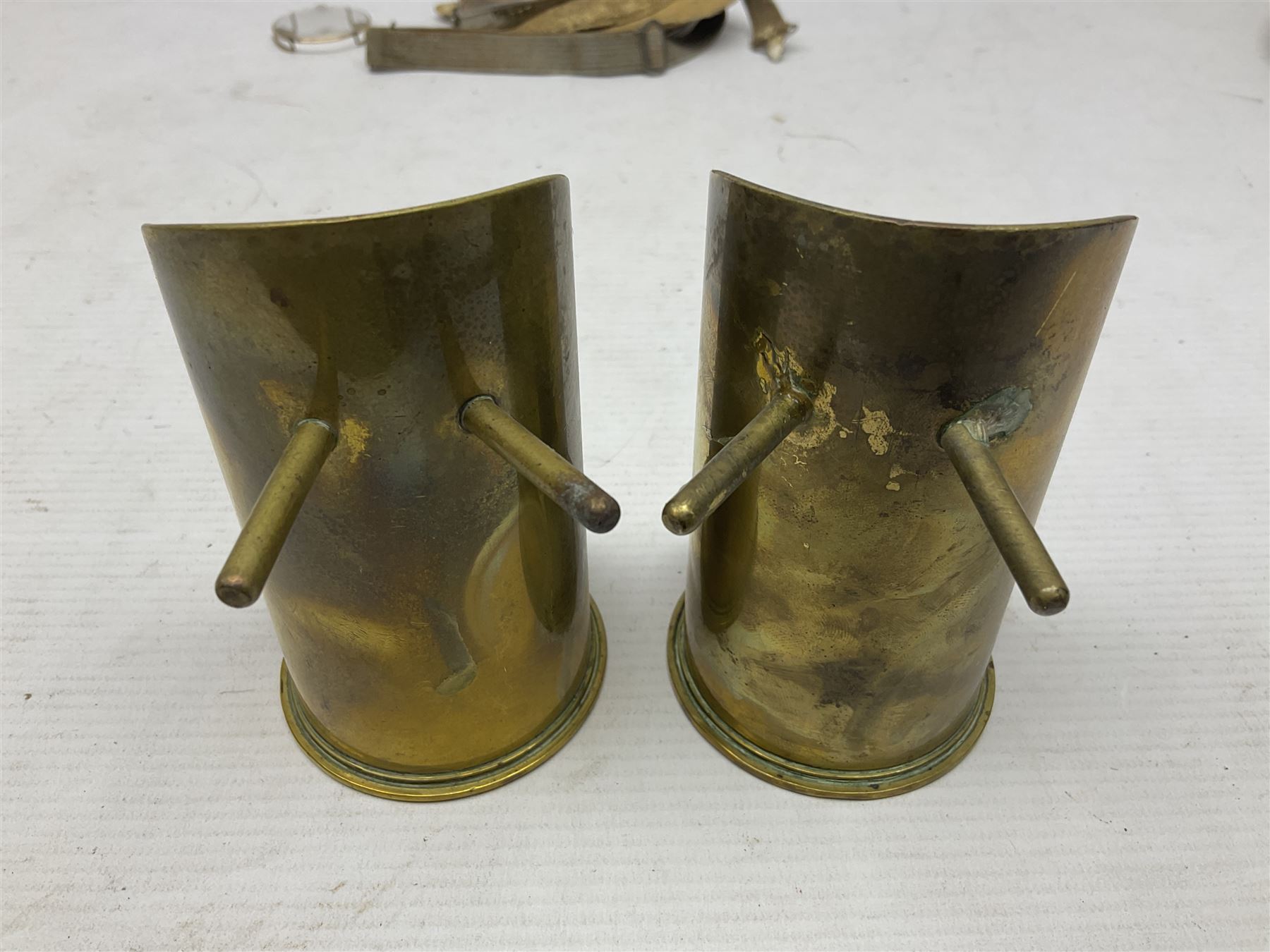 British Army Sam Brown leather belt with Turkish markings; New Zealand Land Forces officer's commission certificate dated 1919; WWII small pair of trench art brass helmet shaped scuttles; and other items