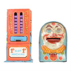 Ten vintage tin plate money boxes, including mechanical clown money bank, Chocolate Slot Machine, Watch Me Grow money box, mechanical Punch & Judy money box, etc, tallest H15cm