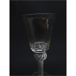  Georgian wine glass, bucket shaped bowl above a knopped air twist stem on conical foot, H15.5cm and another, pan-top bowl above a opaque twist stem with central angular knop on folded foot, H16cm (2)   