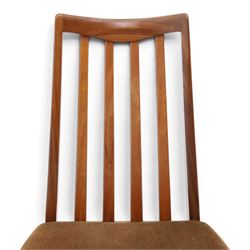 G Plan - Mid 20th century teak extending dining table and four chairs, oval top with stowed fold-over leaf extending to 208cm, raised on two shaped supports united by a stretcher 