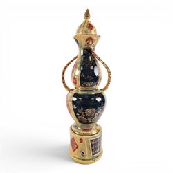 Large Royal Vienna covered urn, the central panels decorated with dancing figures and gilt detail, with twisted handles, H56cm