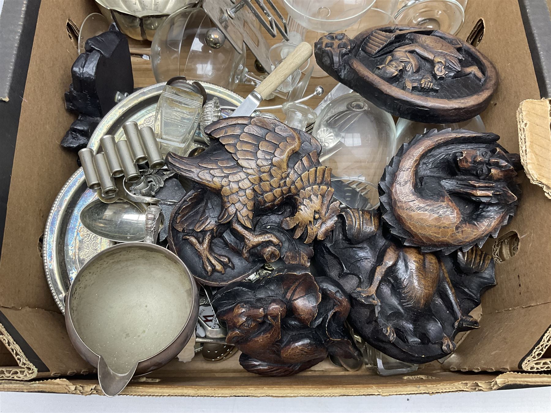Collection of replica Cathedral carvings, together with other glass and metalware, in two boxes 