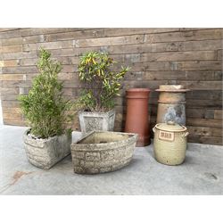 Two cast stone corner planters, square planter other Yorkshire Rose, two terracotta chimney pots and a terracotta bread bin (6)