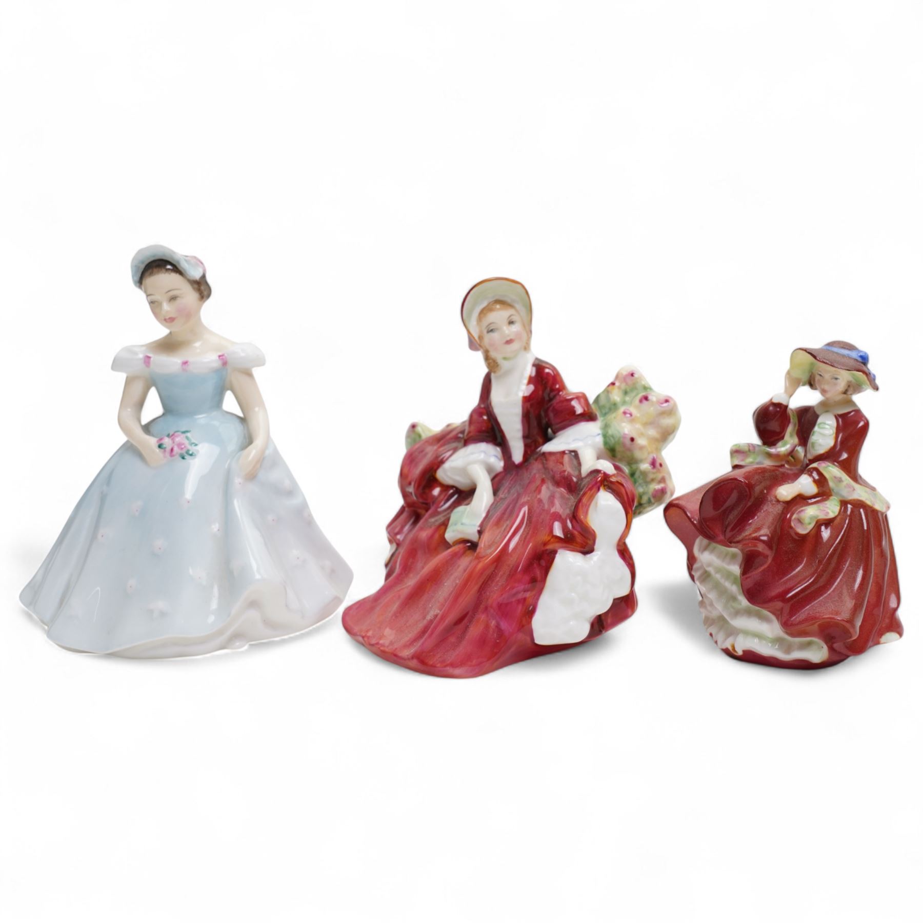 Eleven Royal Doulton figures, including Miss Demure HN1402, Ninette HN4717, Janet HN1537, Embrace HN4258 etc 
