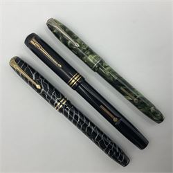 Three Conway Stewart fountain pens, comprising Cracked Ice 28 pen, the black and pearl white barrel engraved Conway Stewart 28 and double banded cap, with gold nib stamped 14ct, together with a Conway Stewart 75 lever fill pen, the green marble barrel and cap with single band and gold nib stamped 14ct and Conway Stewart 55 lever fill fountain pen with black barrel and cap with single broad band and two narrow bands with gold nib stamped Duro 14ct, largest L13cm