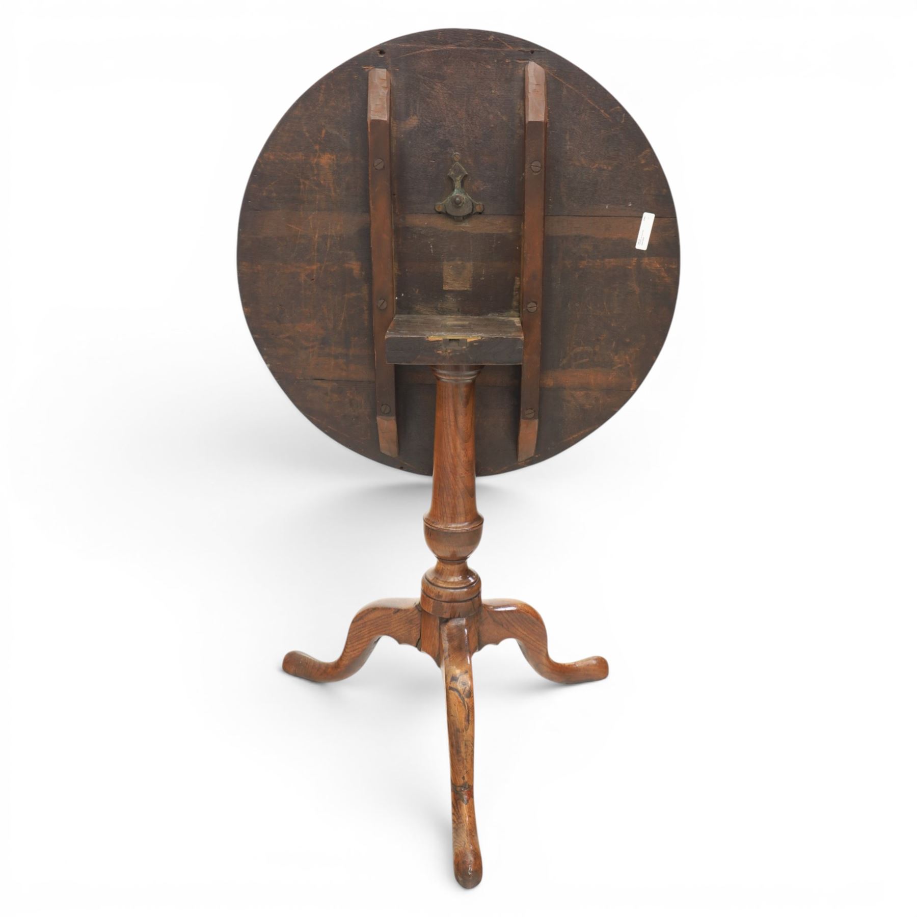 Georgian oak tripod table, plank top raised on a turned baluster column, raised on cabriole supports 