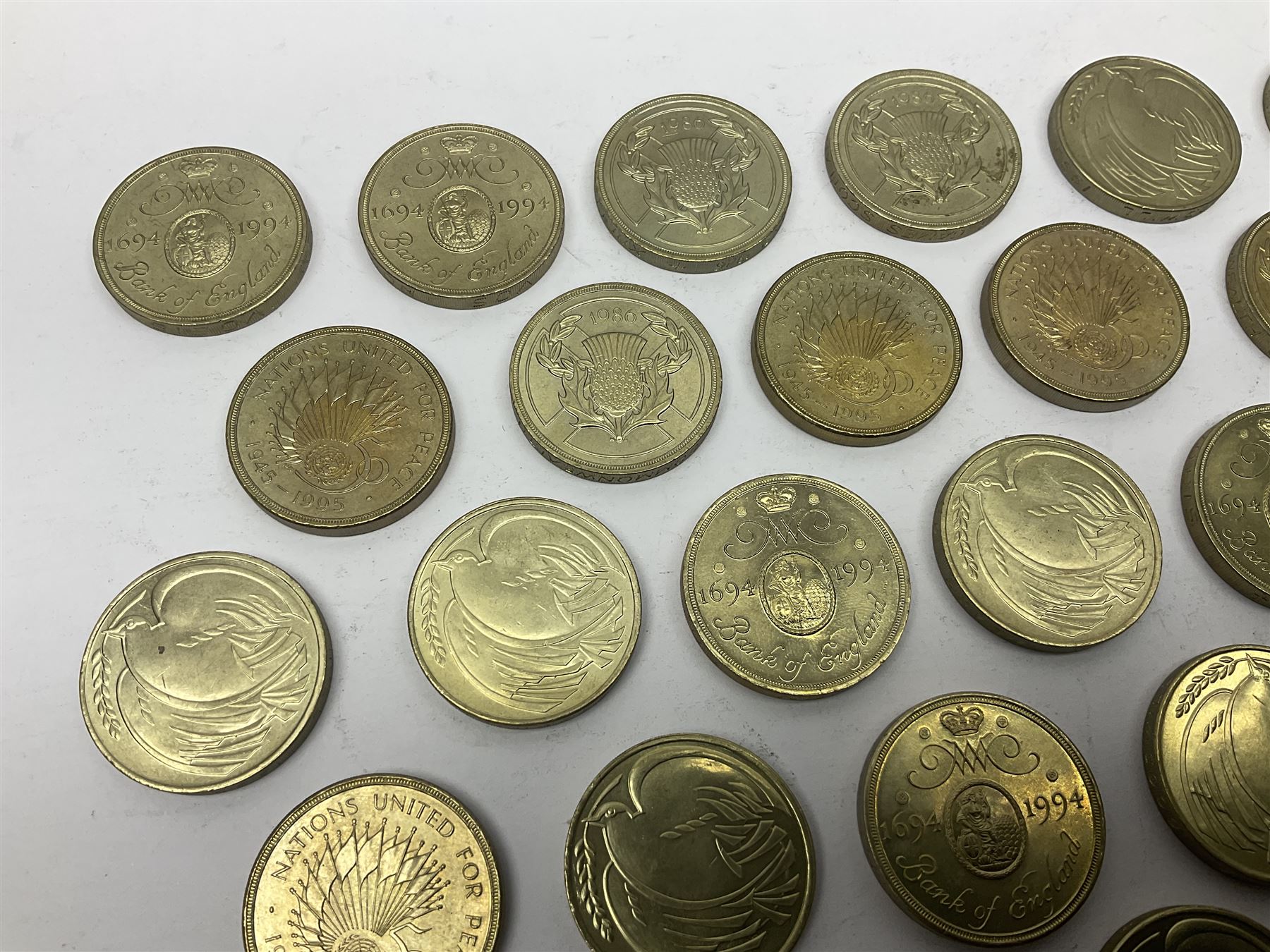 Twenty-eight Queen Elizabeth II old style two pound coins, including 1994 'Bank of England' etc