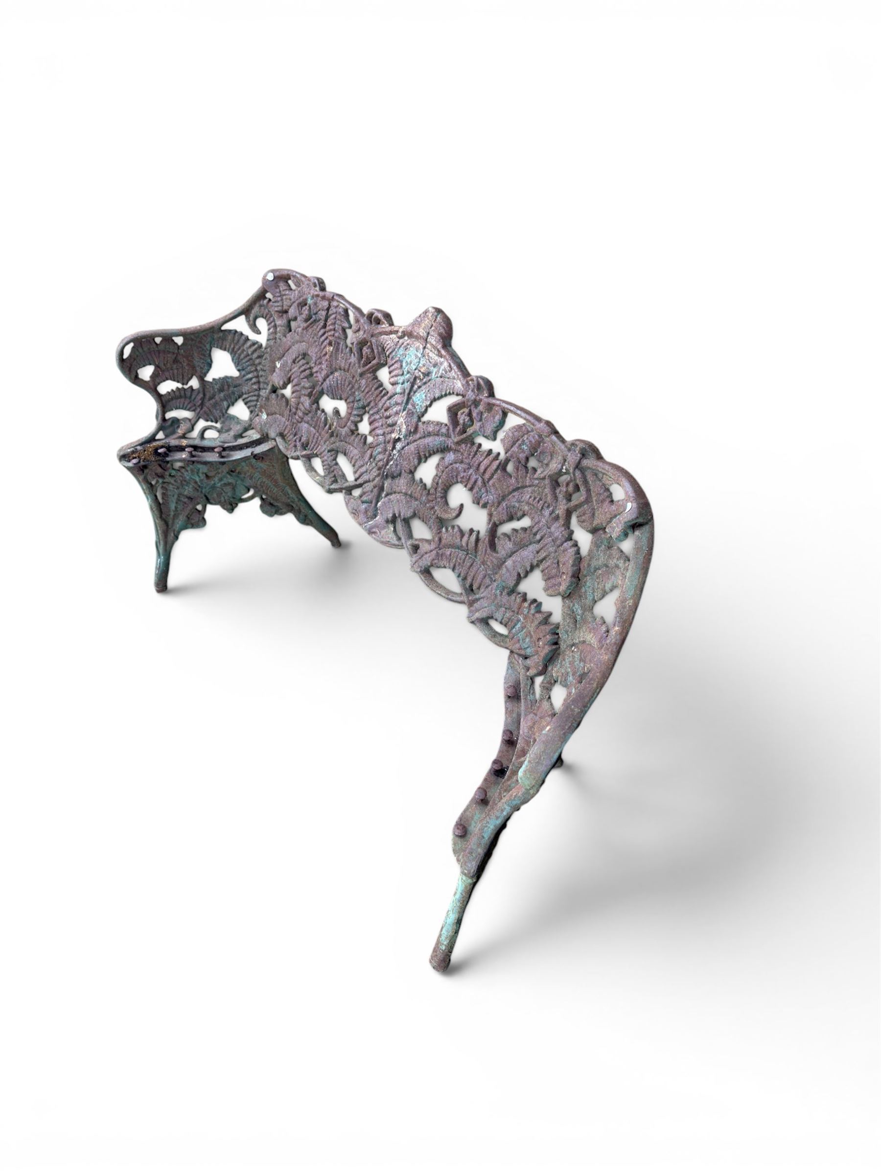 Victorian naturalistic design heavy cast iron garden bench, well defined fern pattern curved back-rest with arms, lacking seat slats for restoration