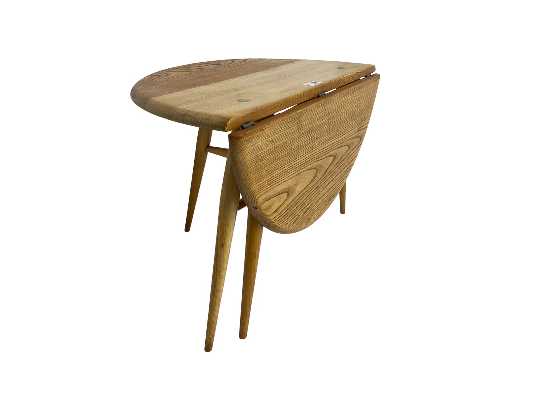 Ercol - elm and beech '308 Folding Occasional Table', circular top with gate-leg and splayed tapering supports
