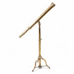 Late 20th-century lacquered brass telescope, the barrel on a telescopic stem, and a tripod stand 