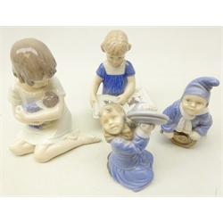  Four Royal Copenhagen figures Girl with Doll 1938, Girl Reading Book 674, Drummer 3647 & Girl with cymbals 3677 (4)   