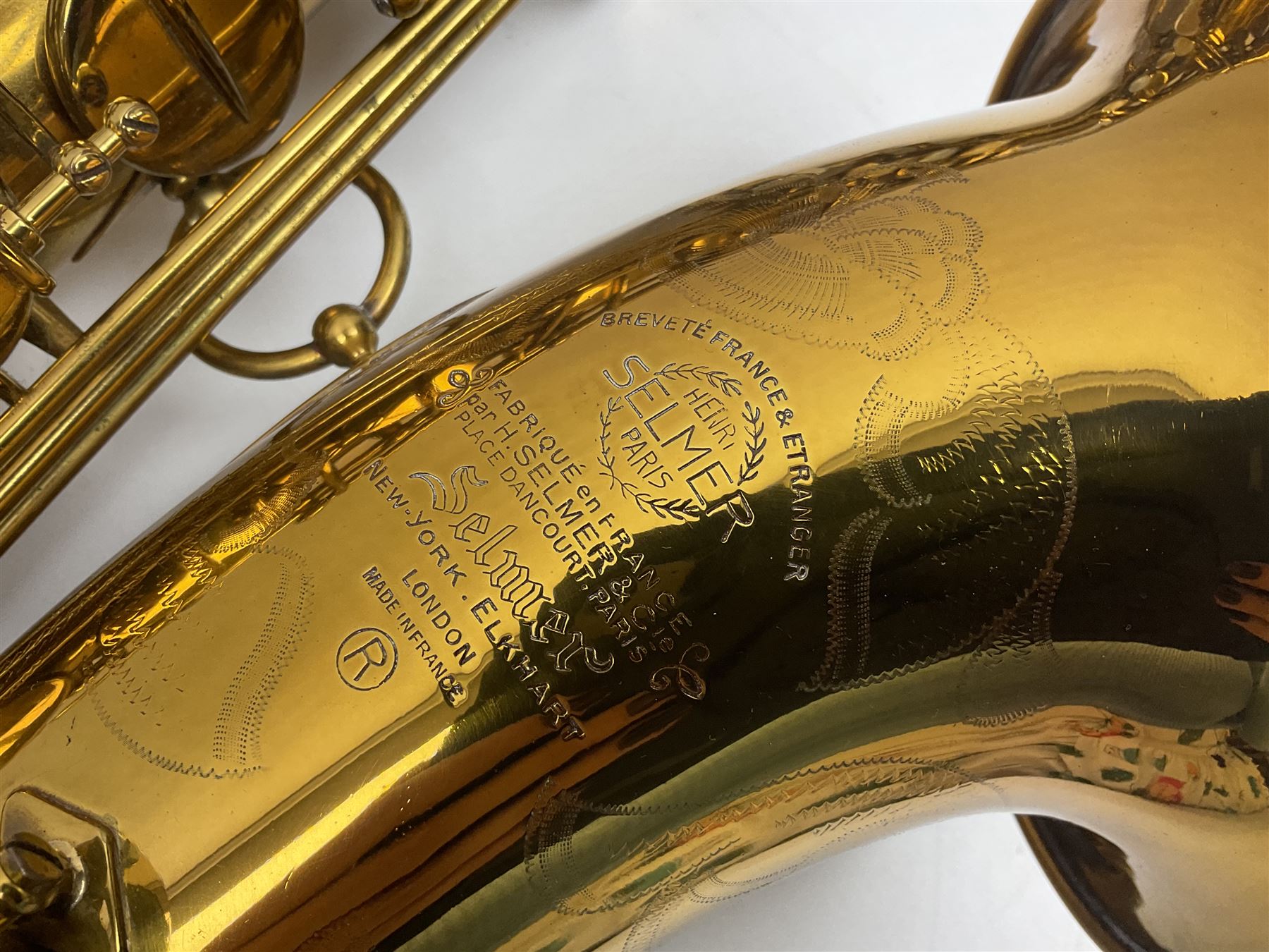 Mid-20th century French Henri Selmer Mark VI tenor saxophone, serial no.M.70644 for 1957, various French, English and American patent numbers, crudely stamped J.A.Brown twice to thumb rest; in fitted hard case with crook and other accessories including two Berg Larsen mouthpieces, reed cutter etc
