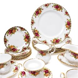 Royal Albert Old Country Roses tea and dinner ware comprising six dinner plates, five dessert bowls, sauce boat and stand, four breakfast cups and saucers, three tea cups and four saucers, six tea plates, milk jug, sugar bowl and bread and butter plate