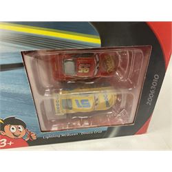 Disney Pixar 'Cars' - Smash & Crash Derby Playset; Willy's Butte Transforming Track Set; Carrera 1 First; Wall Clock; and five cars; all boxed (9)