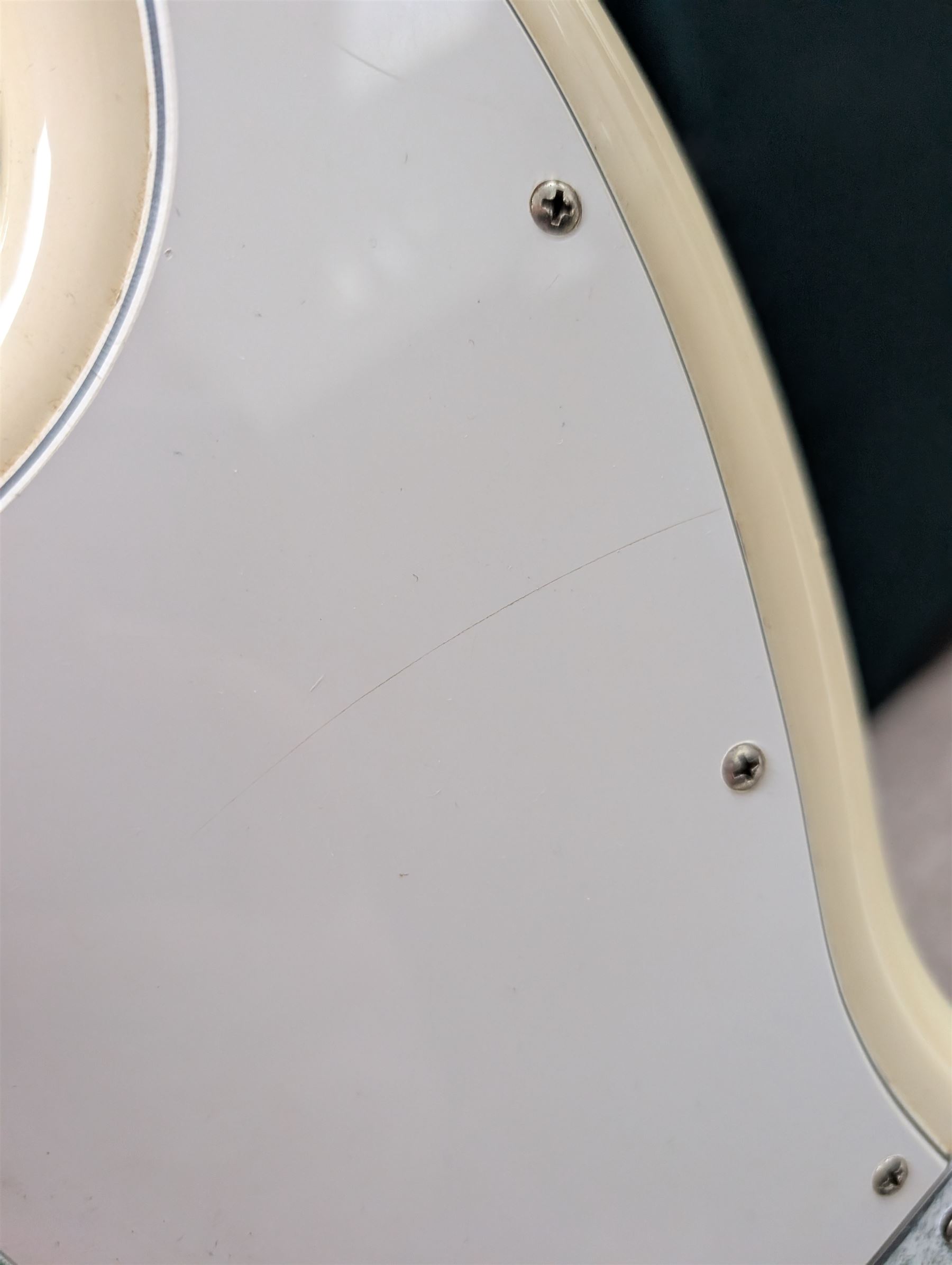 Fender jazz bass guitar, serial no. MZ7182451 made in Mexico c.2007, with cream body, white scratch plate, maple neck, guitar L120cm