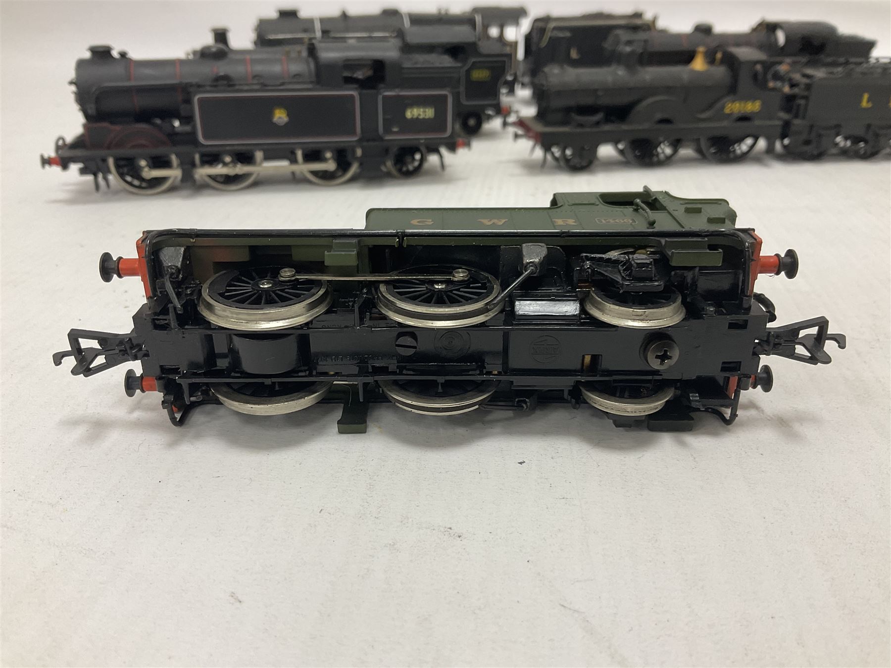 Airfix ‘00’ gauge - seven locomotives comprising Class 7P (Royal Scot) ‘Royal Scots Fusilier’ 4-6-0 no.6103 in LMS black with Mainline tender; two Class N2 0-6-2T no.69531 in BR black; Class 1282 2-4-0 no.20185 in LMS black; Class 61XX 2-6-2T no.6167 in BR black; Class 14XX 0-4-2T no.1466 in GWR green, all unboxed; Class 4F 0-6-0 no.4454 in LMS black, in original box (7)