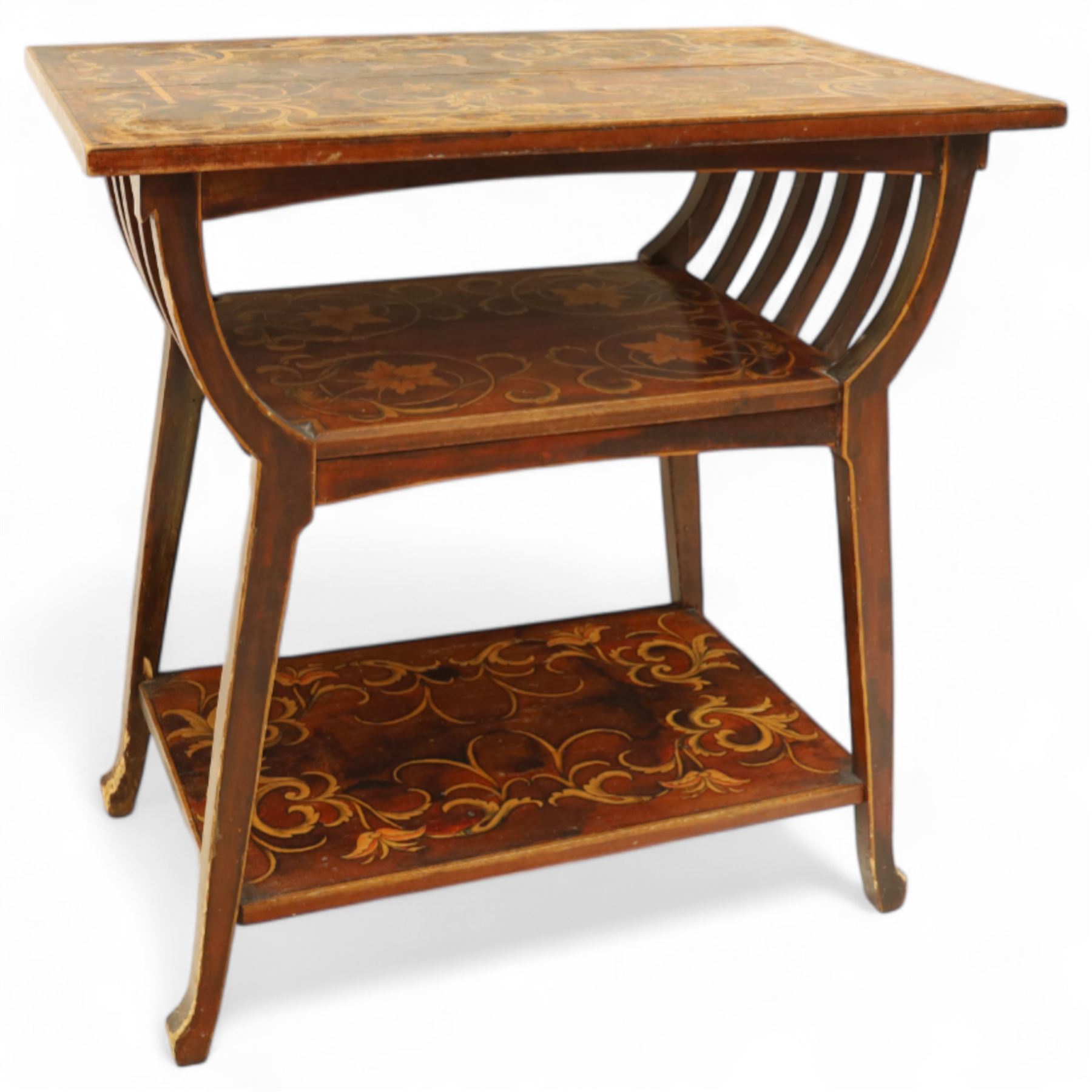 19th century mahogany coal scuttle, shaped raised back carved with shell fan motif, swing front enclosing original removable metal liner with handle, panelled front with cast drop handle, over slatted undertier (H 65cm, W 33cm, D 34cm)
Early 20th century mahogany magazine table, rectangular top and undertier decorated with gilt foliate and scroll marquetry, shaped pierced side rails forming magazine divisions, on square tapering supports (H 70cm, W 71cm, D 45cm)