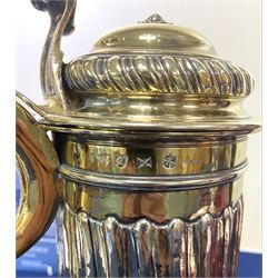 Georgian silver-gilt wine flagon with spiral ribbed body scroll handle and hinged cover, hallmarked London 1725, with later refinements (re-struck by the London Assay 2021), approx 58oz, height 33cm