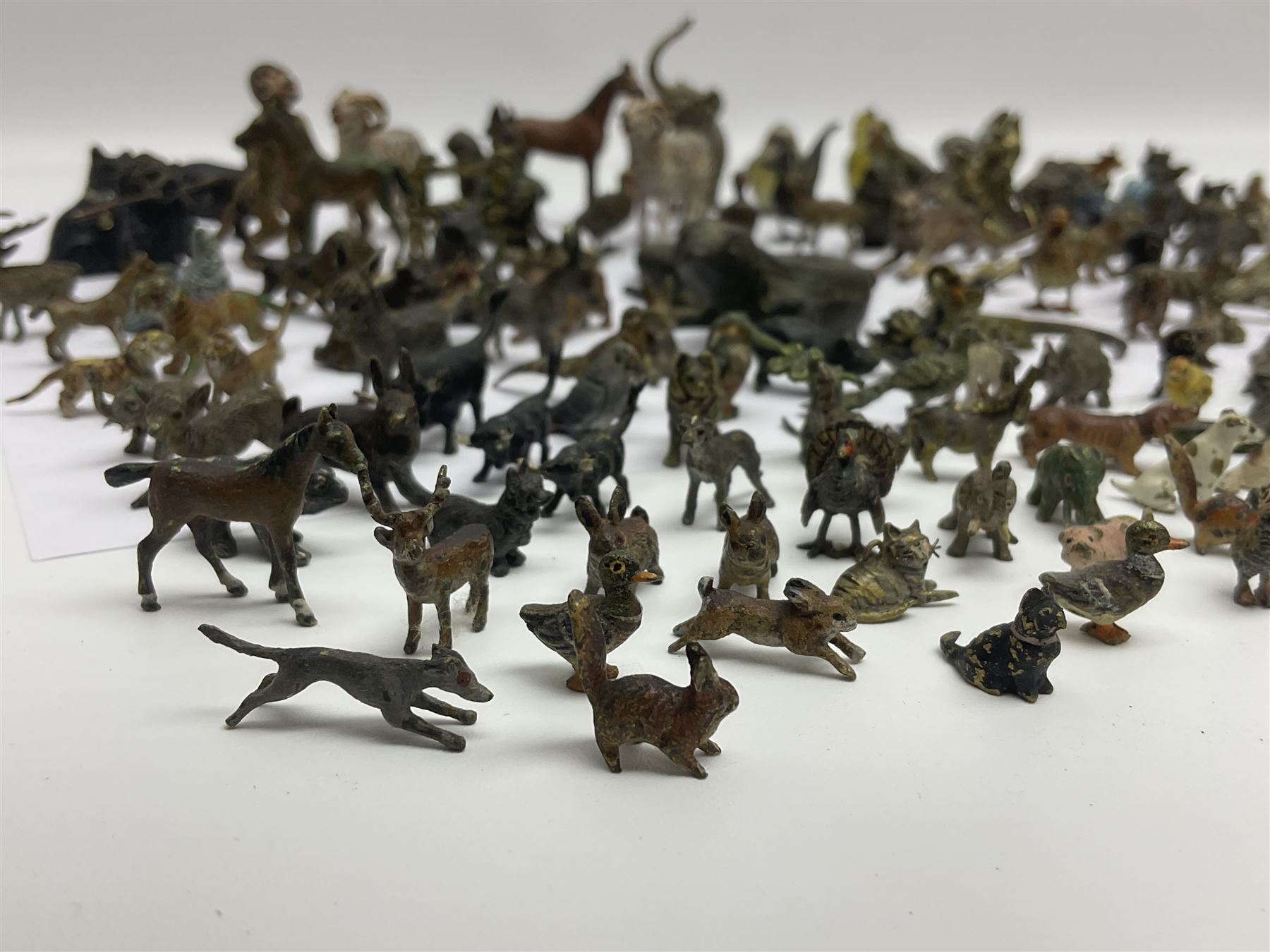 Collection of miniature cold painted bronze and similar animals, to include birds, sheep, horses etc 