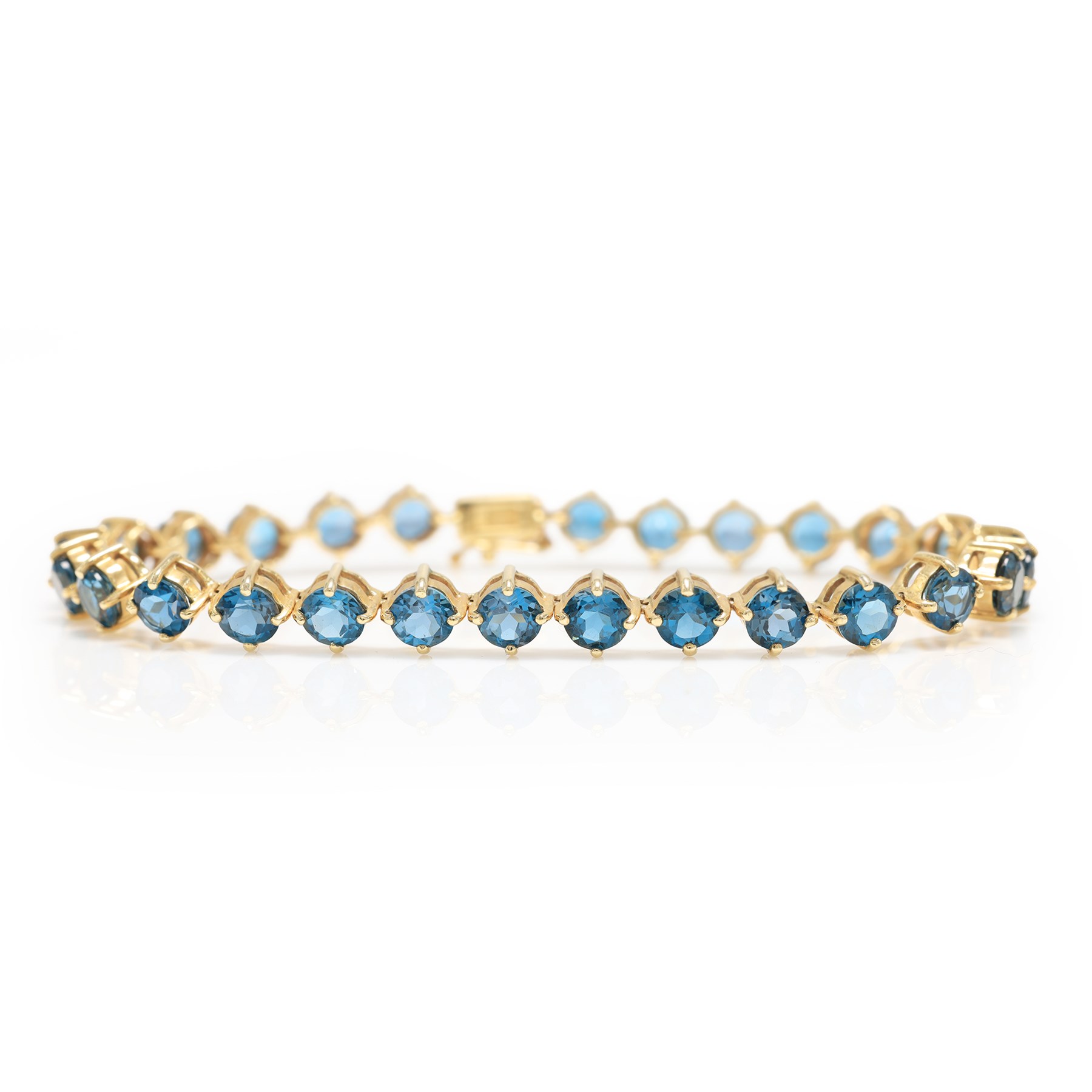 9ct gold London blue topaz bracelet, set with twenty-seven round cut topaz's, Birmingham 2006