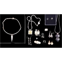 Silver jewellery including Victorian 'Forget Me Not' brooch, Troll Bead snake chain necklace with fish clasp, six pairs of silver earrings, two necklaces etc