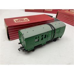Hornby Dublo - sixteen goods wagons comprising 4644 21-Ton Hopper Wagon, 4315 Horse Box (BR) with horse, 4316 Horse Box (SR) with horse, 4649 Low Sided Wagon with tractor, 4301, 4310, 4311, 4312, 4313, 4320, 4626, 4648, 4652, 4675, 4678 and B550200 (Mineral Wagon); all in red boxes (16)