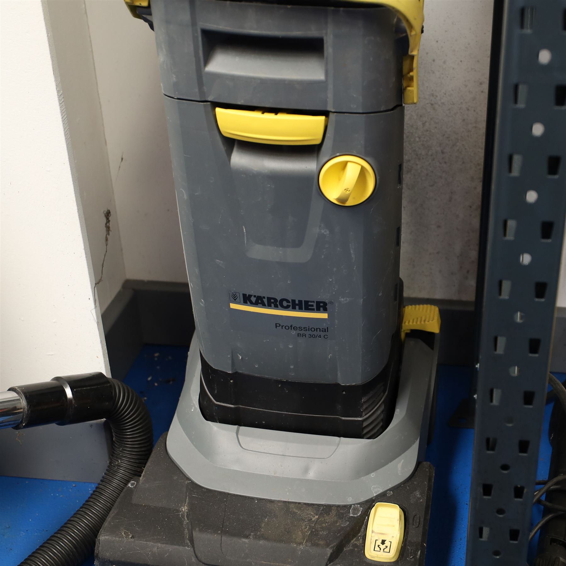 Karcher professional BR 30/4 C upright scrubber dryer floor cleaner; and a Karcher K2 compact pressure washer 