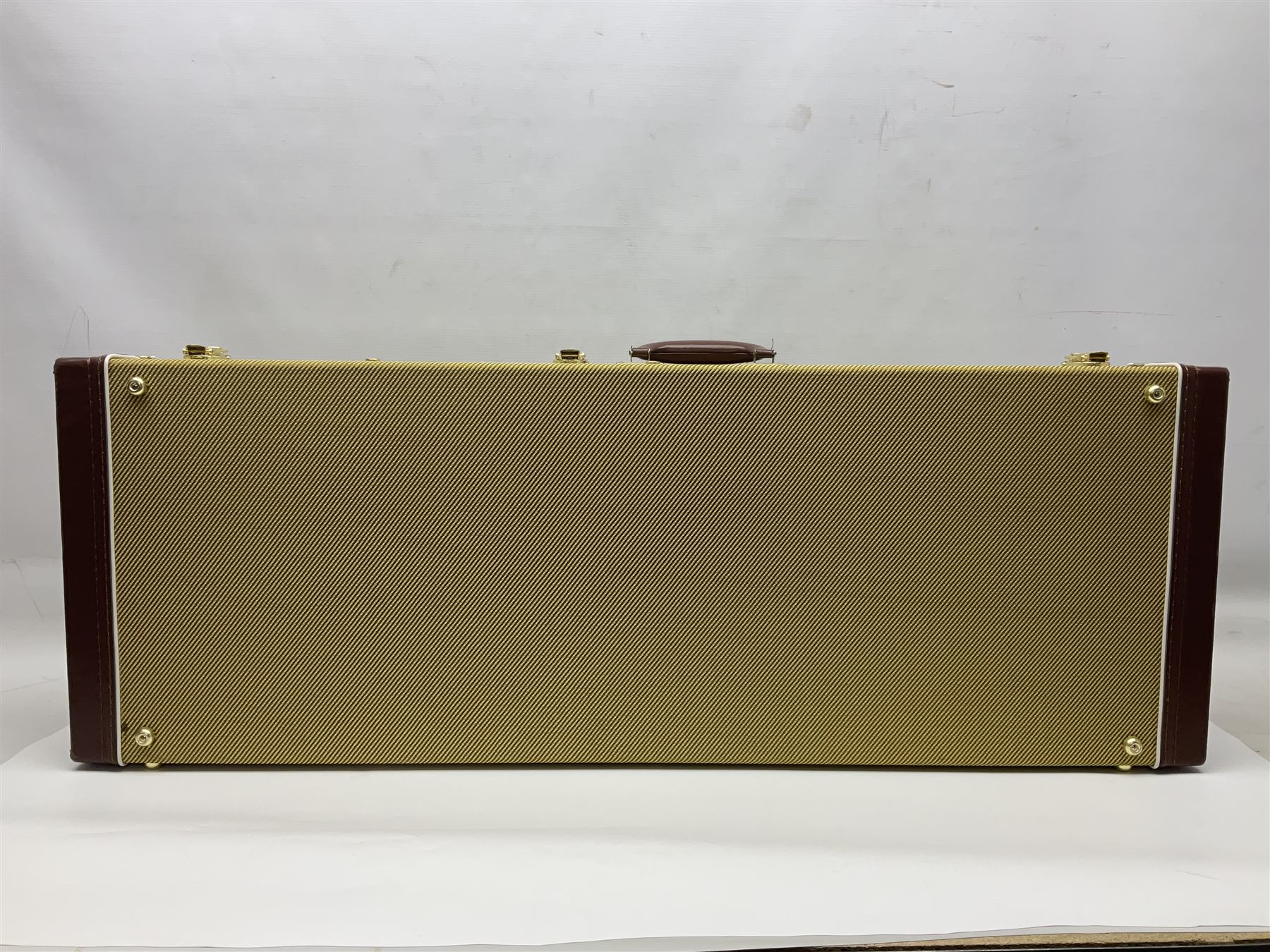 Fender Stratocaster 50th Anniversary 2004 metallic gold electric guitar; serial no.MZ4116369; L98cm; in Spider fitted case with owners manual and other paperwork, strap and belt buckle etc