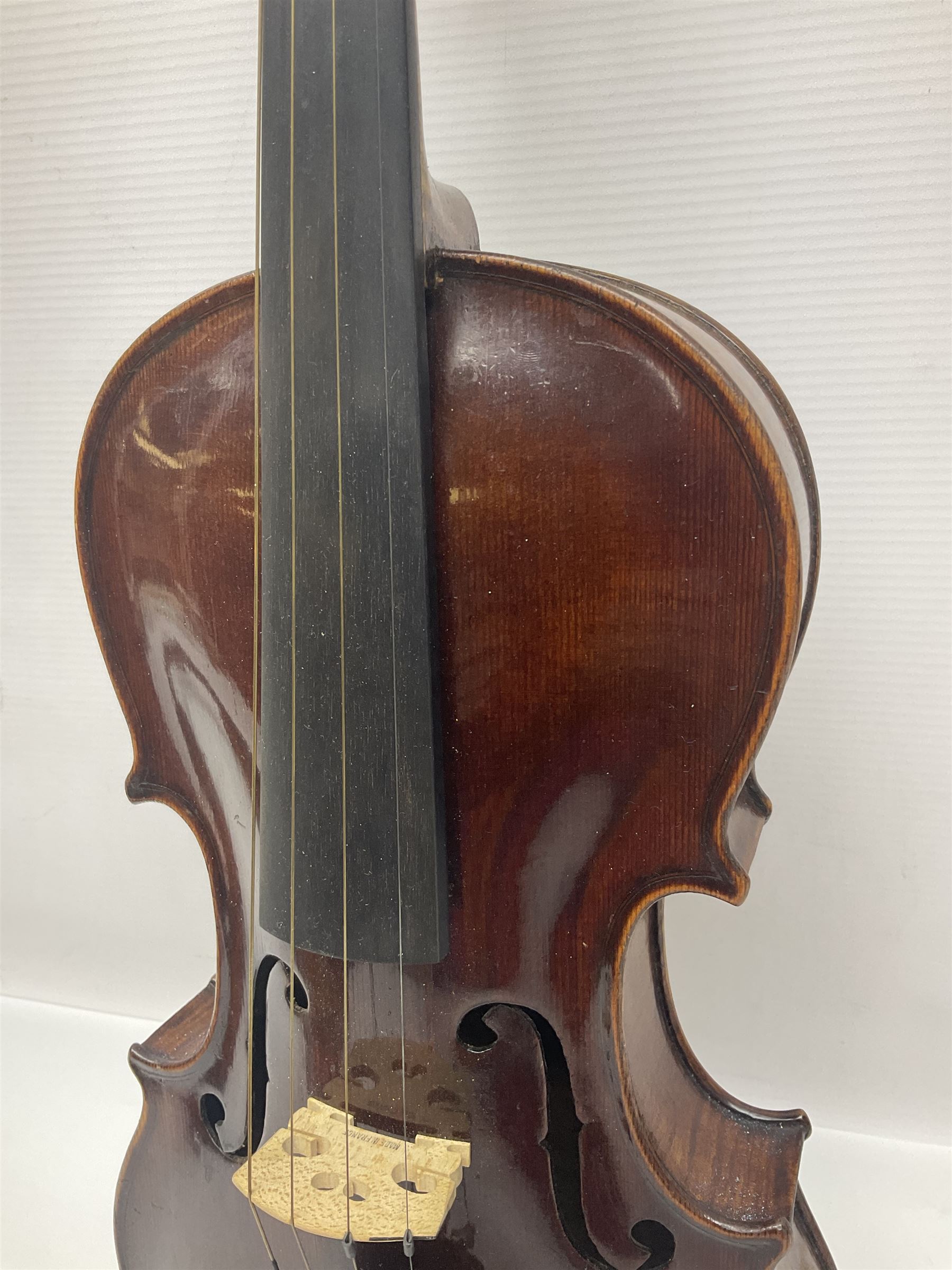 German trade violin in the Steiner style c1900 with 35.5cm two-piece maple back and ribs and spruce top L59cm overall; in fitted carrying case with two bows; and a Saxony violin with 35.5cm one-piece maple back and ribs and spruce top L58.5cm overall (2)