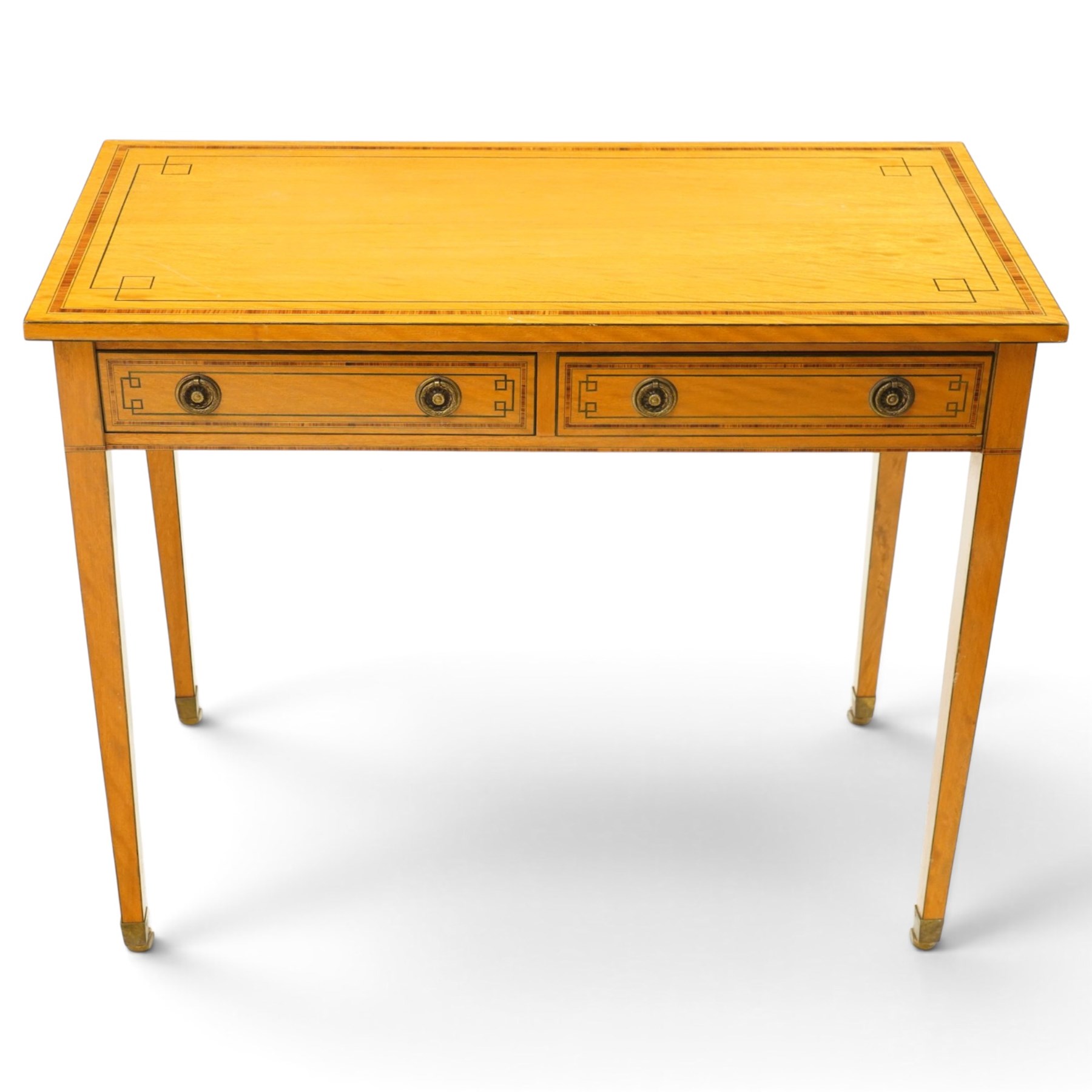Pair of George III design inlaid satinwood console or side tables, rectangular top with mahogany cross-banding and ebony stringing, fitted with two drawers with brass ring handles, on square tapering supports with brass cups and castors