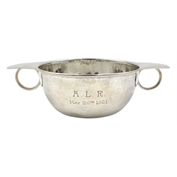 Liberty & Co Arts and Crafts silver quaich, hammered decoration, later engraved initial and date, the base stamped 5778, Birmingham 1920, approx 4.7oz