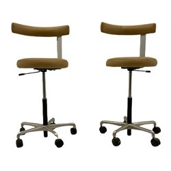 Two vintage chrome and leatherette dentist chairs