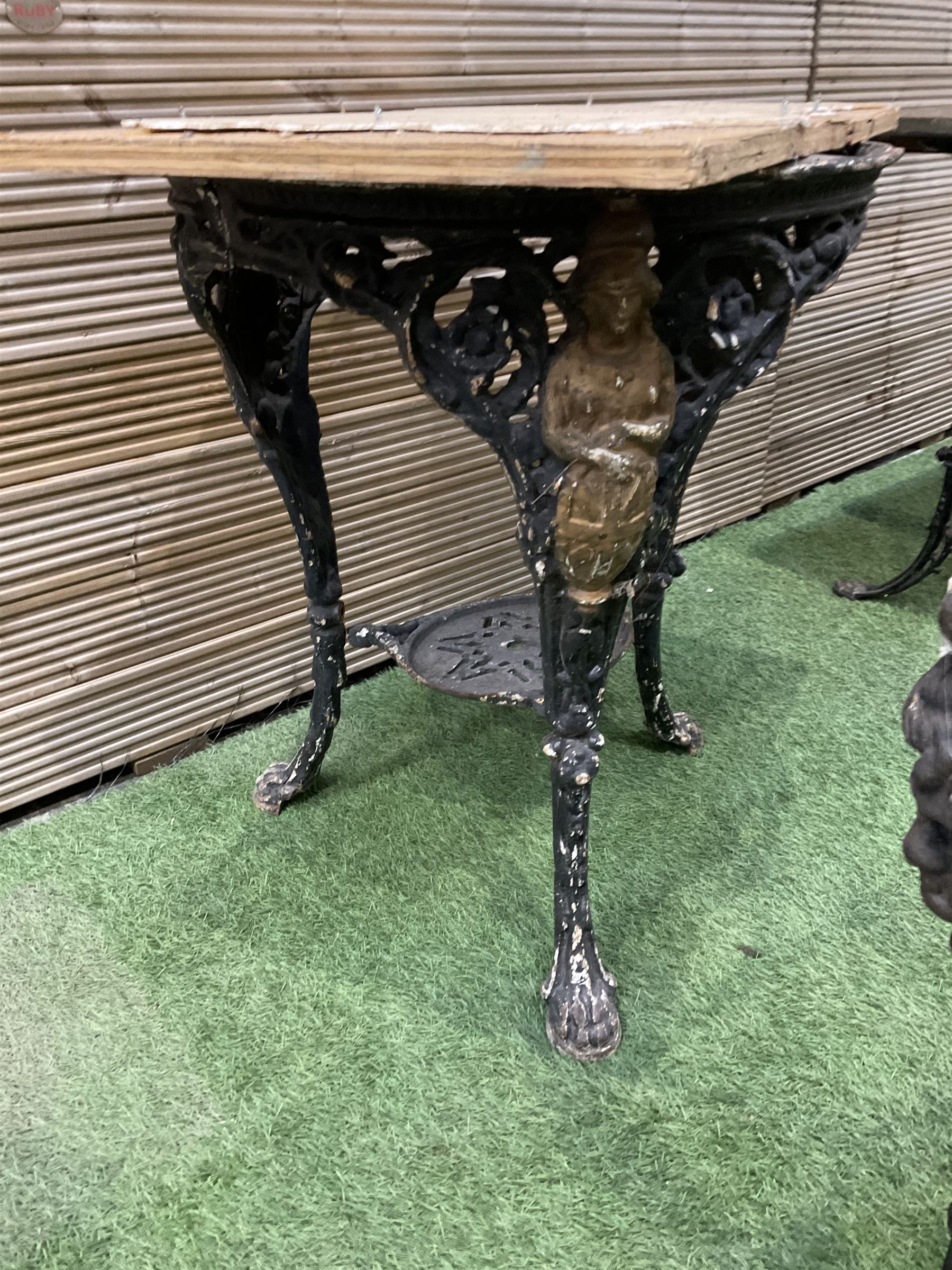 Britannia cast iron pub table, an ornate cast iron rectangular pub table, and three cast iron table bases (5) - THIS LOT IS TO BE COLLECTED BY APPOINTMENT FROM DUGGLEBY STORAGE, GREAT HILL, EASTFIELD, SCARBOROUGH, YO11 3TX