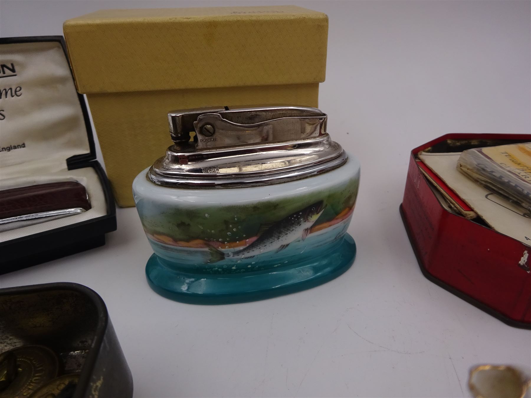 Minton table lighter decorated with a leaping salmon, signed T.Lee, with Ronson lighter mechanism, boxed, together with a Ronson Varaflame lighter, Stratton compact mirror, collection of Wade whimsies and a miniature Gemma teaset