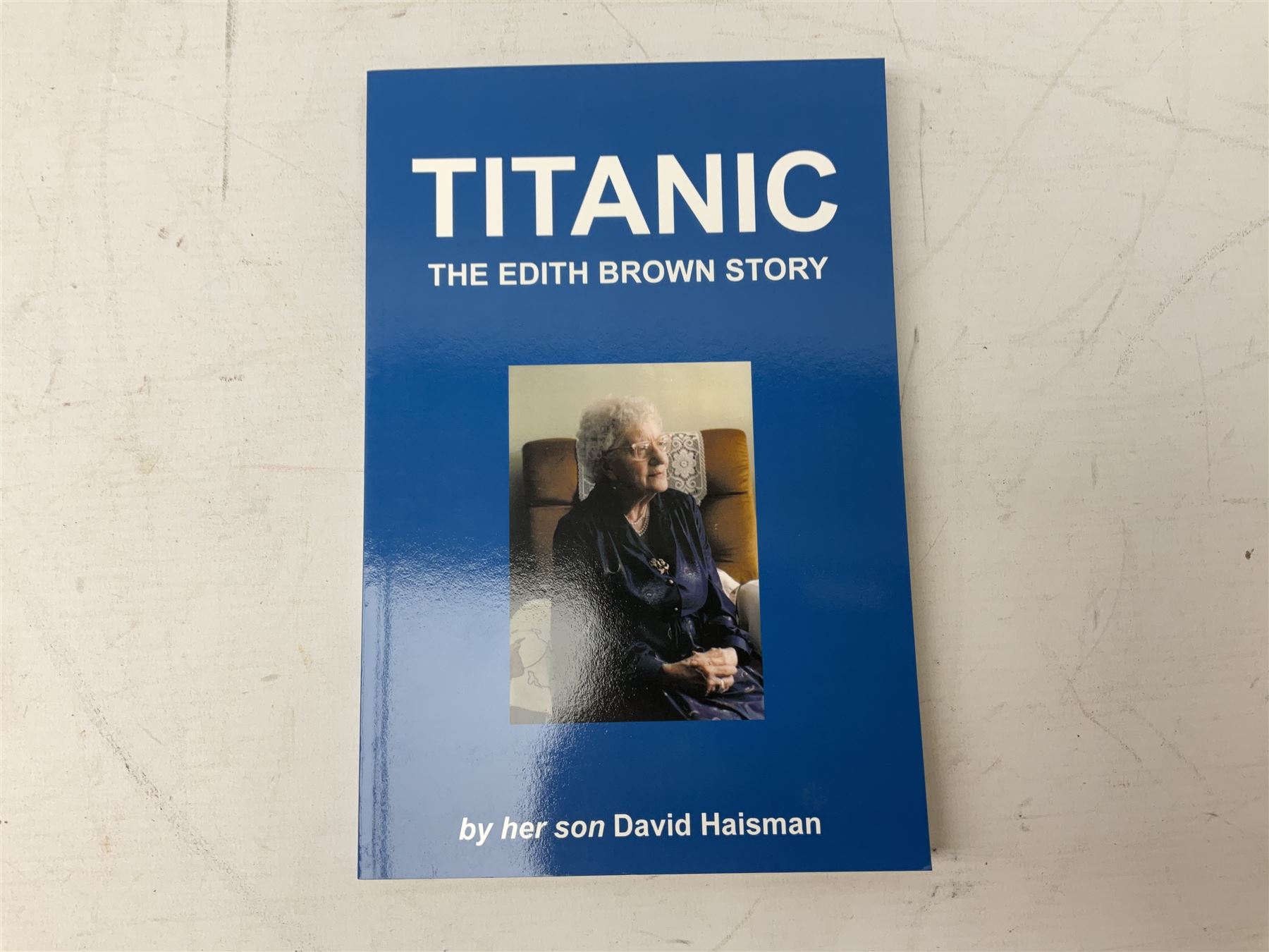 Titanic cover with Canadian cancellation signed David Haisman and cover with Queenstown cancellation signed by stamp designer, book signed David Haisman, two Titanic covers and book signed David Haisman, Titanic Facsimile postcard signed David Haisman and cover with Alderney cancellation signed by stamp designer, Biography of Edith Brown signed David Haisman (9)