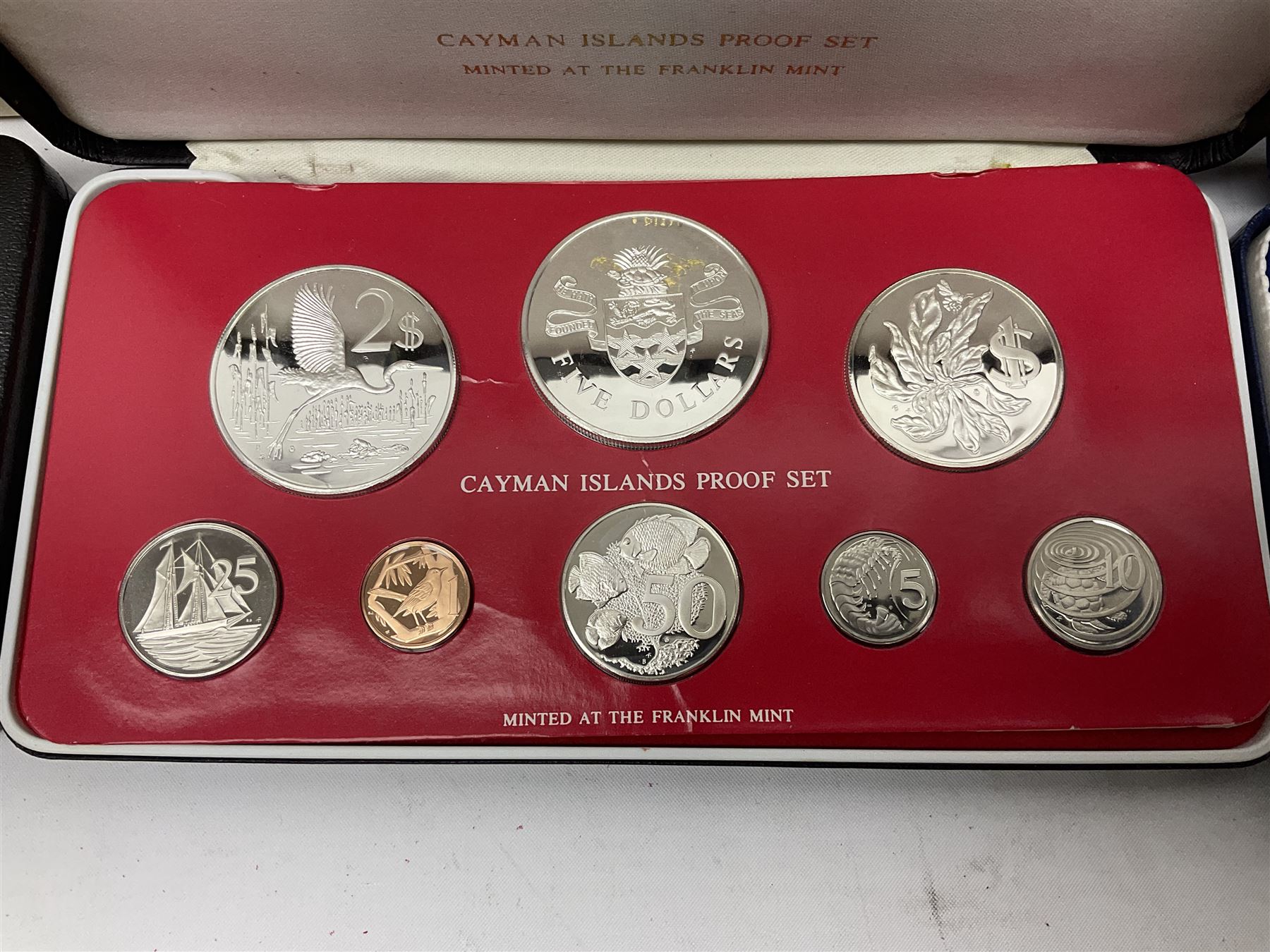 First National Coinage of Barbados 1973 proof eight coin set, from ten dollars to one cent, the ten dollar coin minted in sterling silver, the five dollar coin minted in 800 silver, and a Barbados 1974 proof eight coin set, both minted at The Franklin Mint, cased with certificates; two Republic of Malta decimal proof coin sets, dated 1978 and 1979, the 1979 one pound coin minted in sterling silver, both minted at The Franklin Mint, cased with certificates; Cayman Islands 1973 proof eight coin set, minted at the Royal Canadian Mint, cased; and a Cayman Islands 1979 proof eight coin set, the five dollar to fifty cents coins each minted in sterling silver, minted at the Franklin Mint, cased with certificate (6)