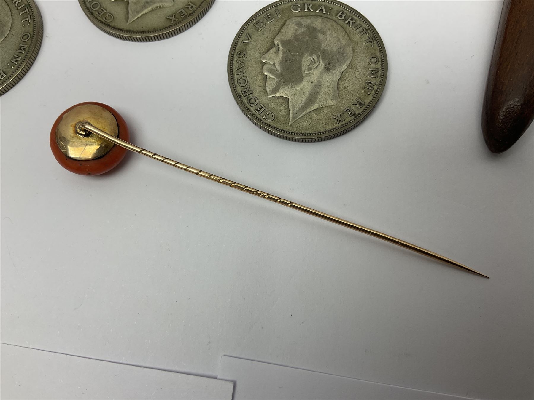 14ct gold coral stick pin, together with six pre-1947 silver halfcrown coins, silver napkin ring, silver mounted pen and other collectables