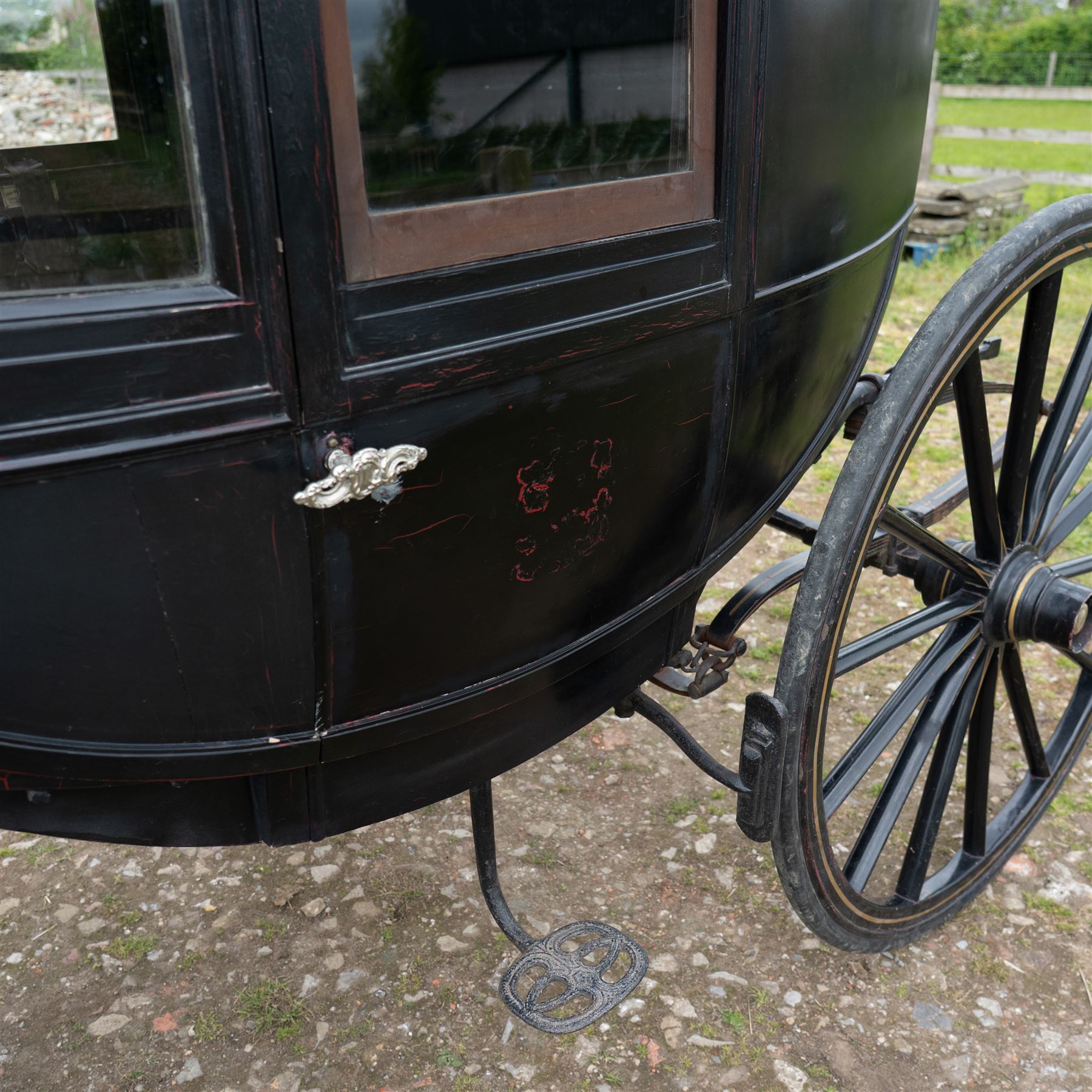 Town Coach by John Marstons Birmingham - Ex Film

A black painted five glass Town Coach by John Marston's Carriage Works Ltd, Birmingham, with enclosed glazed passenger compartment, curved front glass, external coachman's box seat and pole for driving with a pair of horses. The carriage has a timber coach body with buttoned black leather interior, blue upholstered seat cushions, plated exterior door handle, maker plates to the body and step, and John Marston marked hub caps. Mounted on black painted wooden spoked wheels with rubber tyres, leaf spring suspension, underbody turntable steering and iron fittings throughout.
Featured on the film set of 'Victoria' with Jenna Coleman

Features

• Black painted enclosed coach body
• Glazed passenger compartment with five windows
• Curved front glass
• Buttoned black leather interior
• Blue upholstered seat cushions
• External coachman's box seat
• Timber coach body
• Wooden spoked wheels
• Rubber tyres
• Leaf spring suspension
• Underbody turntable steering
• Pole for pair of horses
• Iron foot steps
• Plated exterior door handle
• Maker plates for John Marston's Carriage Works Ltd, Birmingham
• John Marston marked hub caps
• Featured on the film set of Victoria with Jenna Coleman

Dimensions:
Overall length: 390 cm
Width: 190 cm
Height: 214 cm

Wheel Diameters:
Front wheels: 104 cm
Rear wheels: 134 cm

Seating:
Coachman's box: 2
Passenger compartment: 4