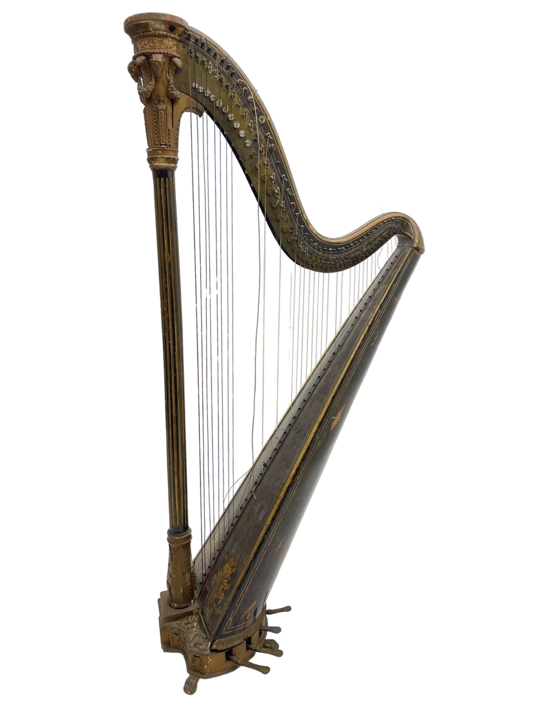 J. Erat. Wardour Street, London, Soho - Regency parcel-gilt and rosewood finish pedal harp, forty-three strings and five swell doors, the fluted pillar decorated with rams head capital, floral festoons, anthemion motifs and sarcophagi, the base decorated with pharaonic motifs and fitted with eight brass pedals, on carved paw feet, brass signature plate to top inscribed 'J. Erat. Wardour Street, London, Soho, 606'