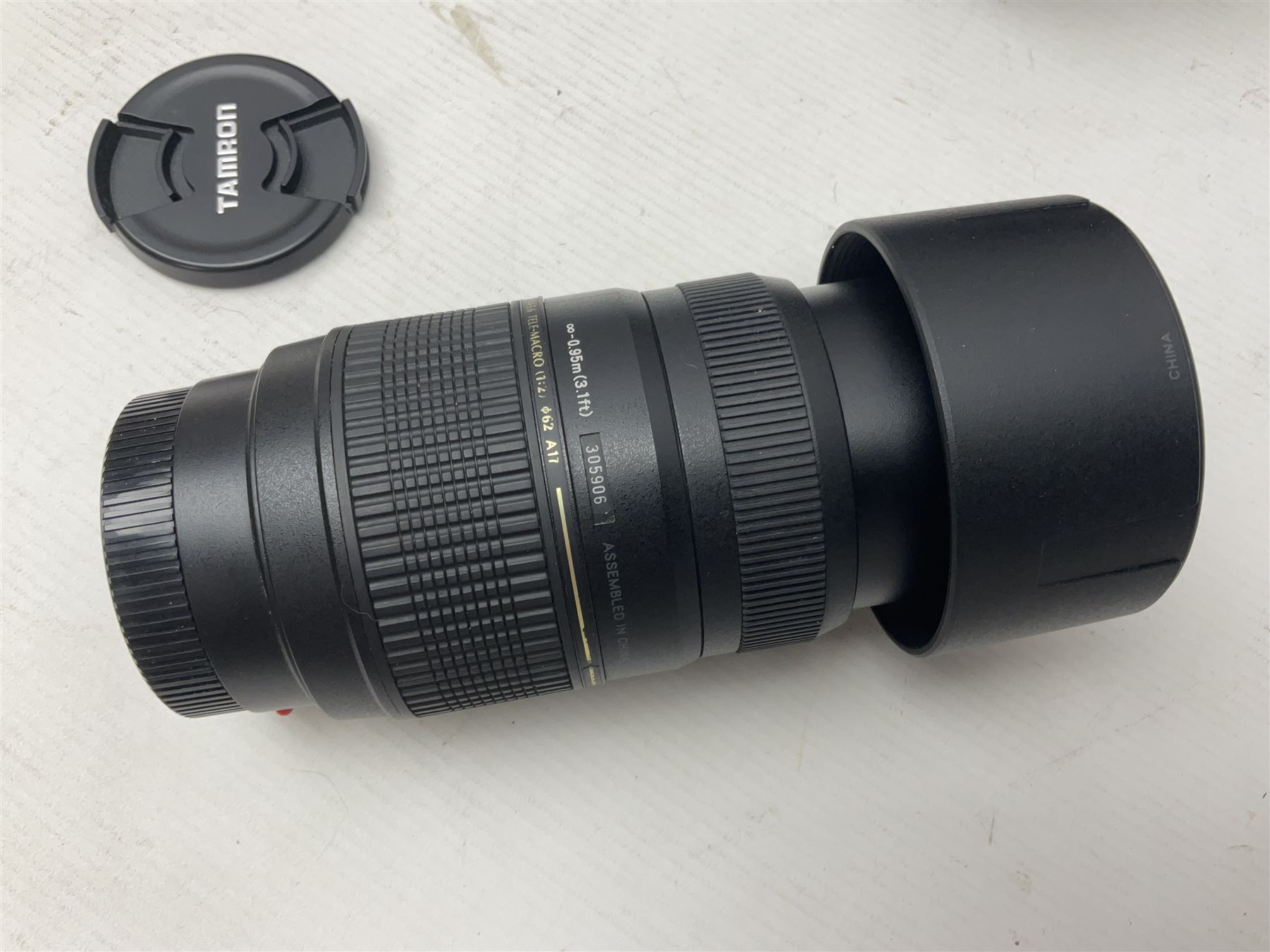 Nikon 'ED AF Micro Nikkor 200mm 1:4D' lens, Tamron 'SP Di AF 180mm 1;3.5 Macro1:1' lens, serial no 501075 and Tamron 'AF 70-300mm 1:4-5.6 Tele-Macro (1:2) ' lens, serial no 305906  