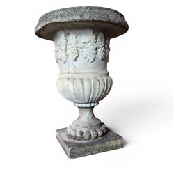 Cast stone classic garden urn, raised on squat pedestal and an ornate cast stone urn (2)