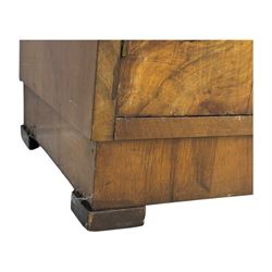 Art Deco burr walnut drinks cabinet, geometric central glazed astragal door enclosing two fixed shelves, flanked by symmetrical bookmatched veneered cupboards with drawers above 