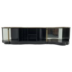 Italian ebonised and gilt serpentine corner console bookcase cabinet, shaped pink marble top over assorted shelves and dividers with fluted pilasters and mirror backs, on skirted base 